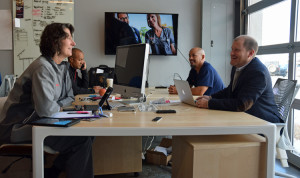 Kevin Riddleberger (front right), the CSO of DispatchHealth, meets with members of the DispatchHealth care team.
